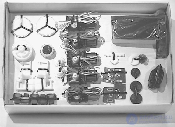   Robotic arm, IBM PC interface and voice control system 