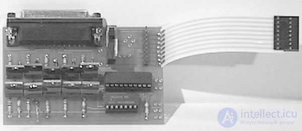   Robotic arm, IBM PC interface and voice control system 