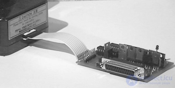   Robotic arm, IBM PC interface and voice control system 