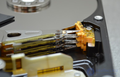 Hard Disk Head Wear: Diagnosis and Assessment